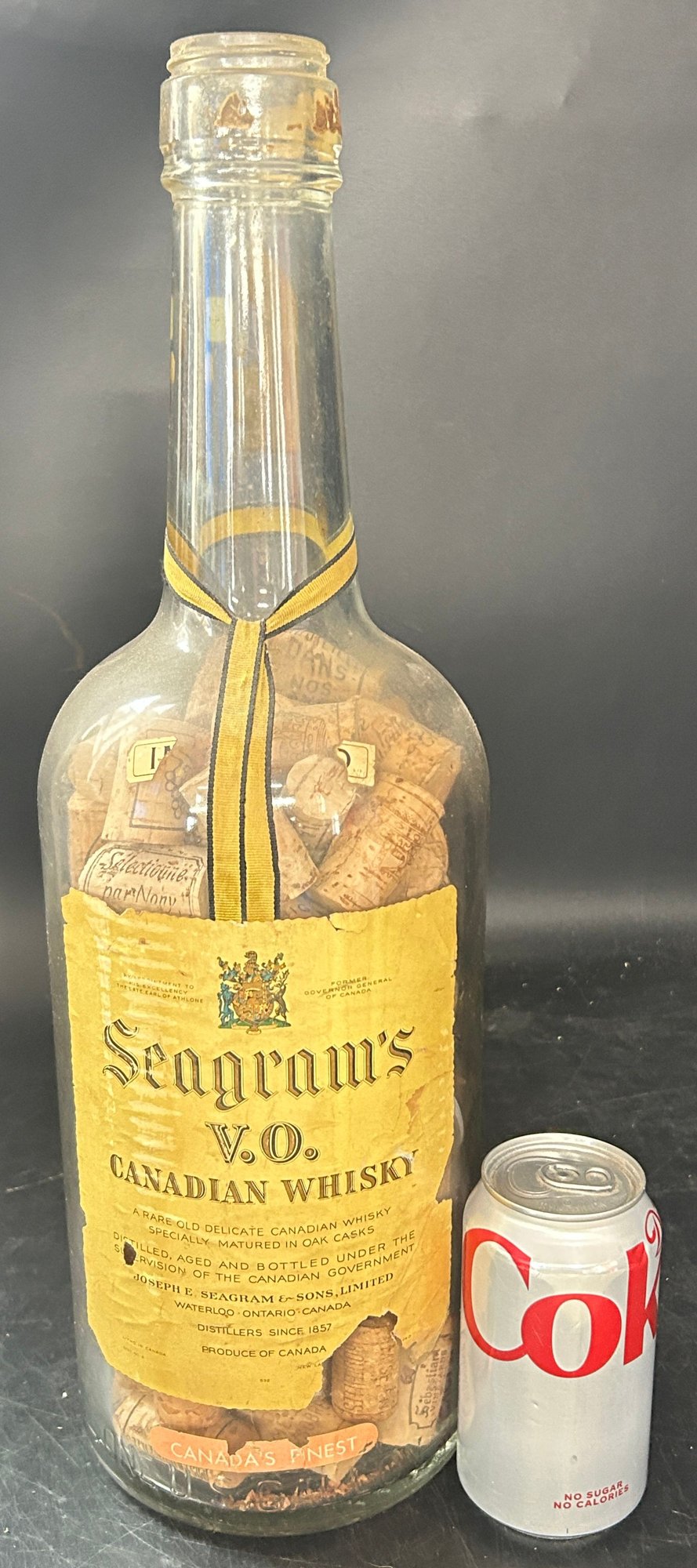 260408-17 Huge Seagrams V.O. Canadian Whisky Bottle Filled With Corks