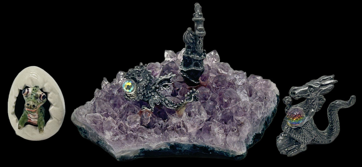 250625-4C Pewter Dragon Holding A Crystal